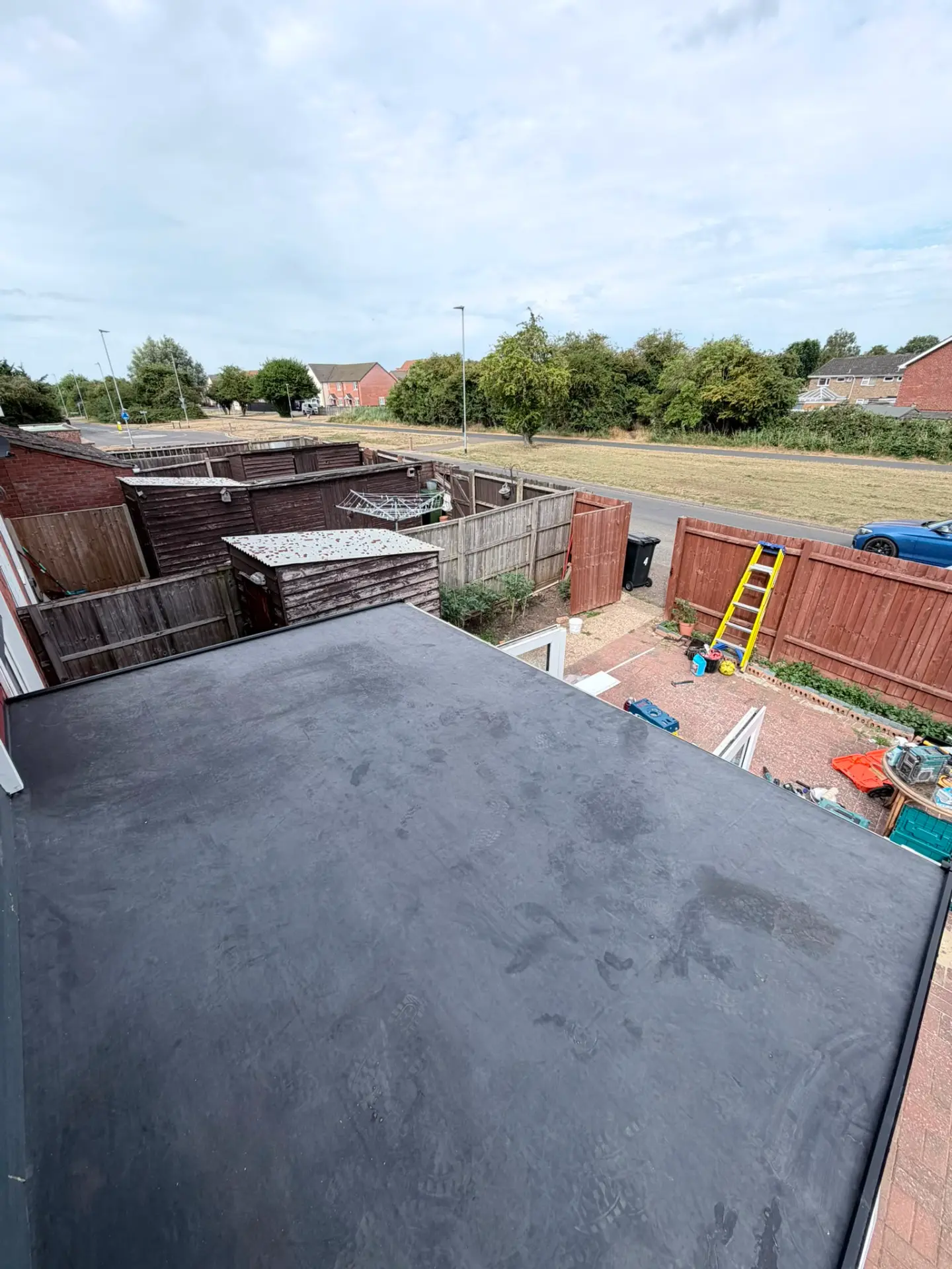 Completed EPDM flat roof with neat trim detail