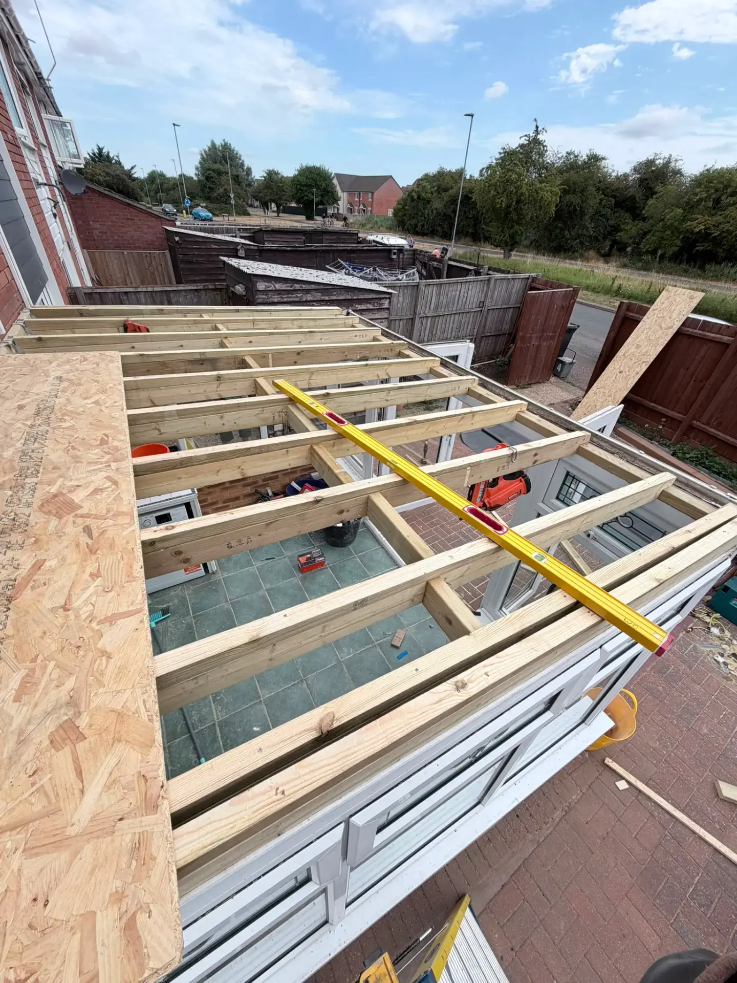 New timber roof joists installed over conservatory
