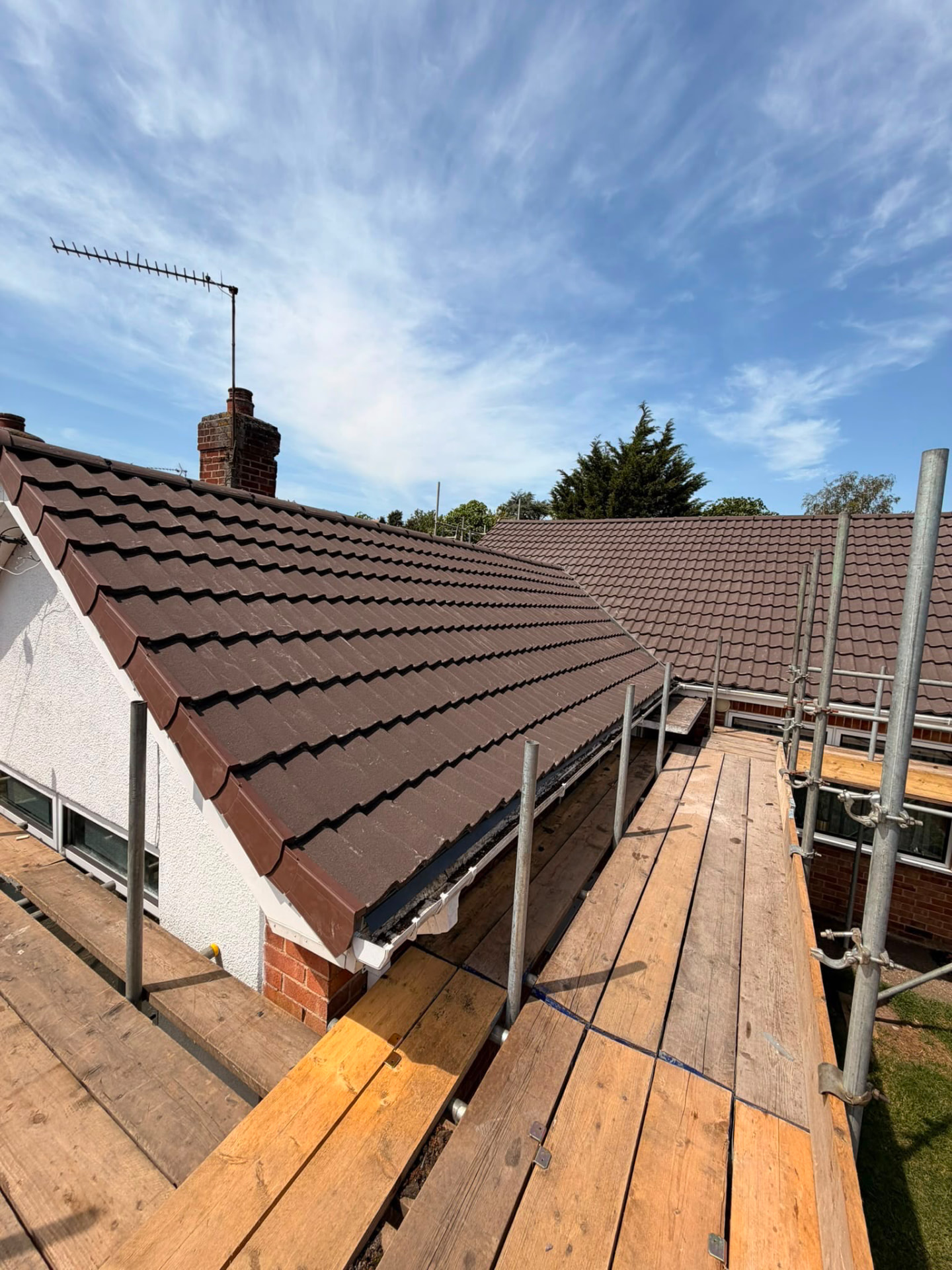 Finished pitched roof against a bright sky in King's Lynn